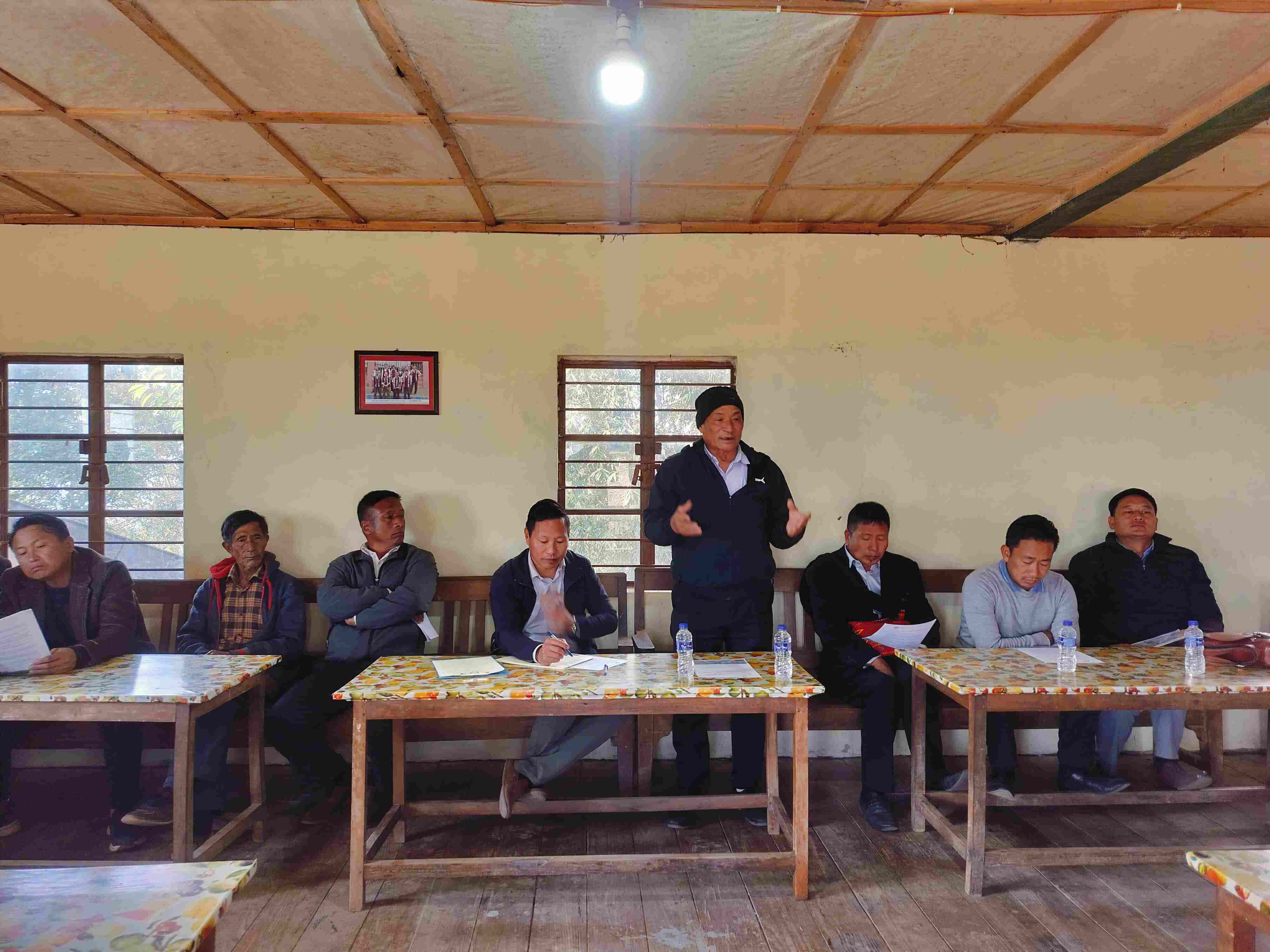 A community meeting in a village hall in Nagaland.